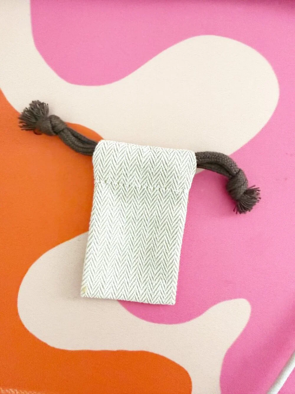 Hermes Small Drawstring Pouch in Beige with Brown Cord 2.25x1.8 - Picture 2 of 3